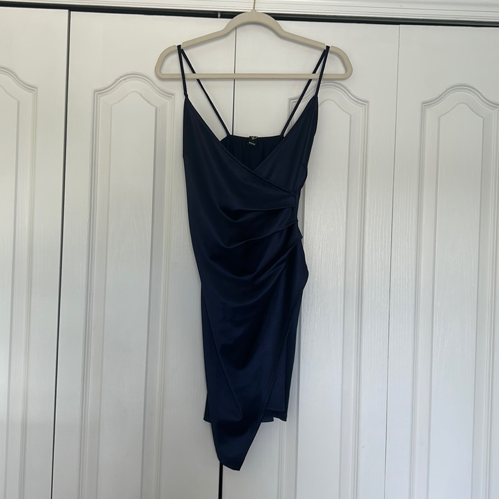 This is a formfitting dress with a slit!